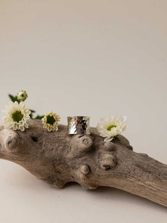 a piece of wood with flowers on it
