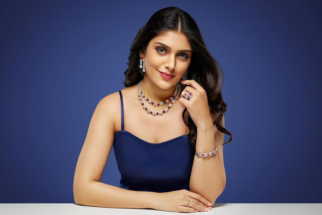 A woman in a blue dress sitting at a table